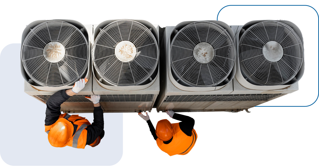 técnicos profesionales trabajando en la instalación y mantenimiento de un sistema de climatización para empresas